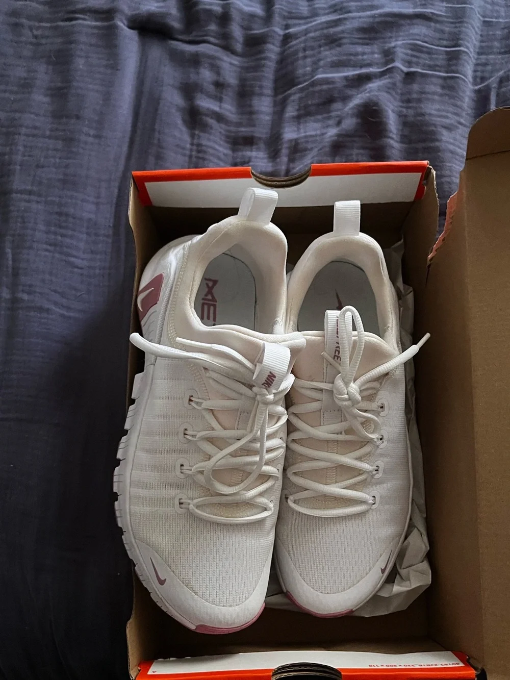 Nike White Athletic Trainers with Pink Accents